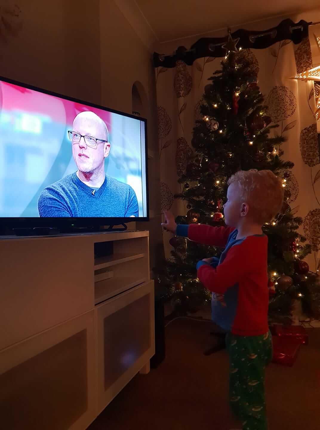 Ellis watching the Look North segment from home