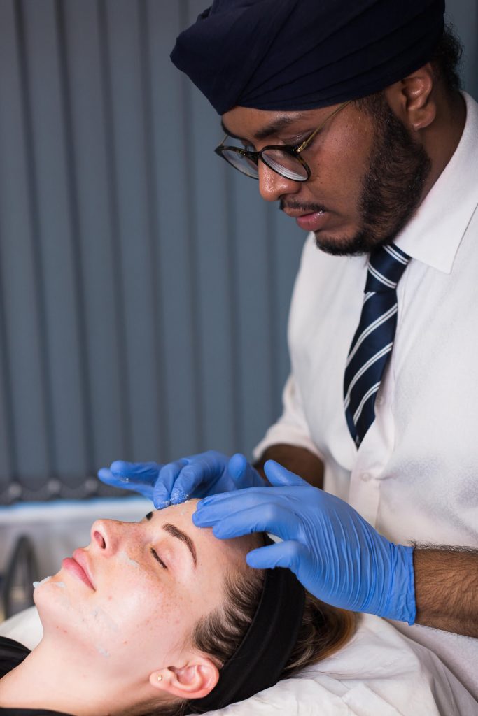 Patient undergoing face peel treatment