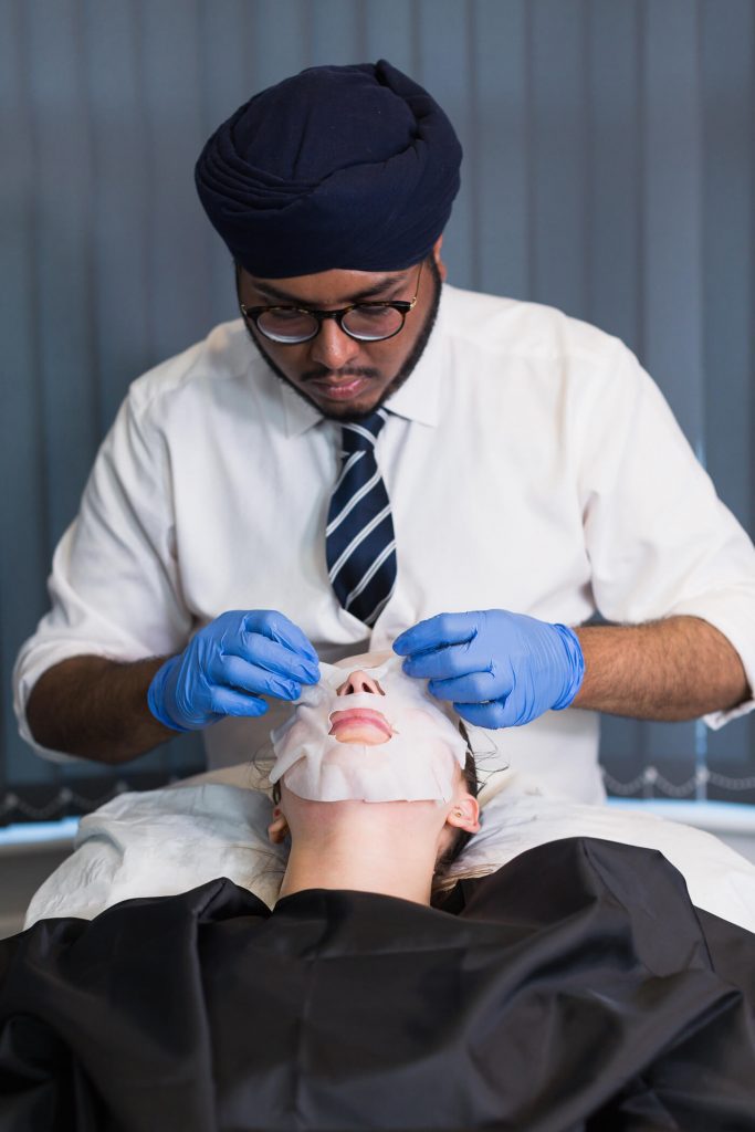 Patient undergoing face peel treatment