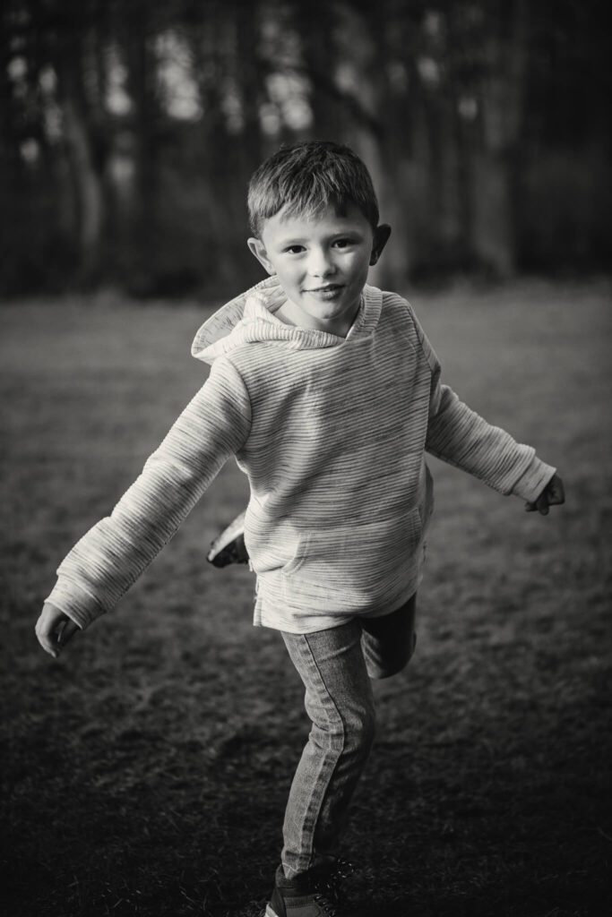 Black and white photography portrait of a young boy