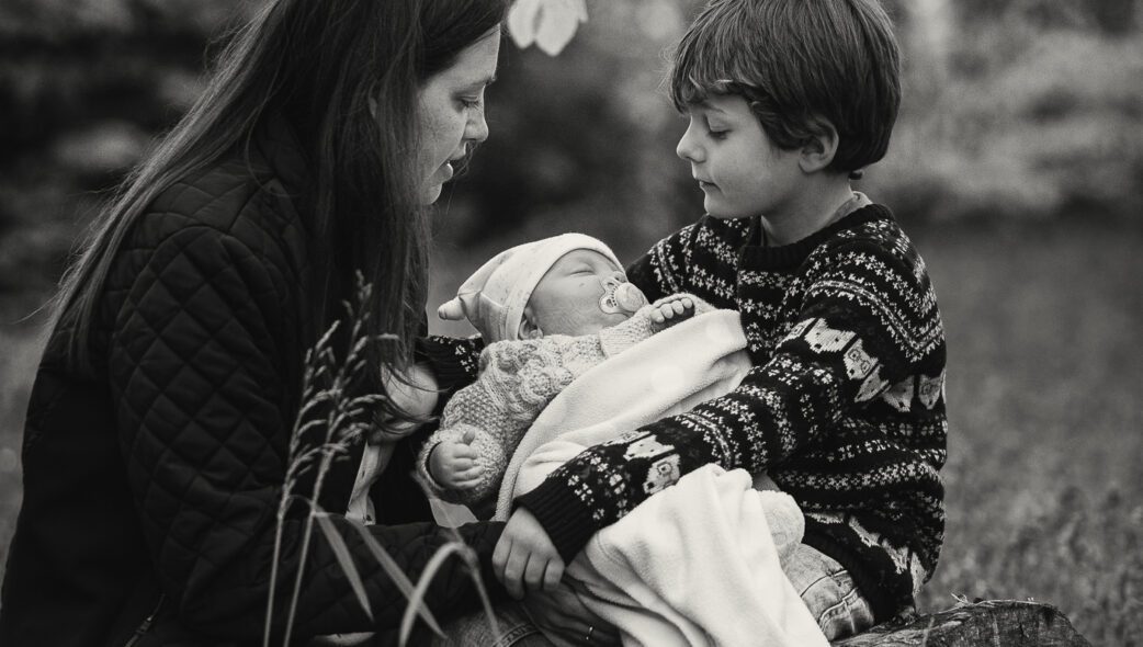 Family photography - Portrait of a mother, son and baby