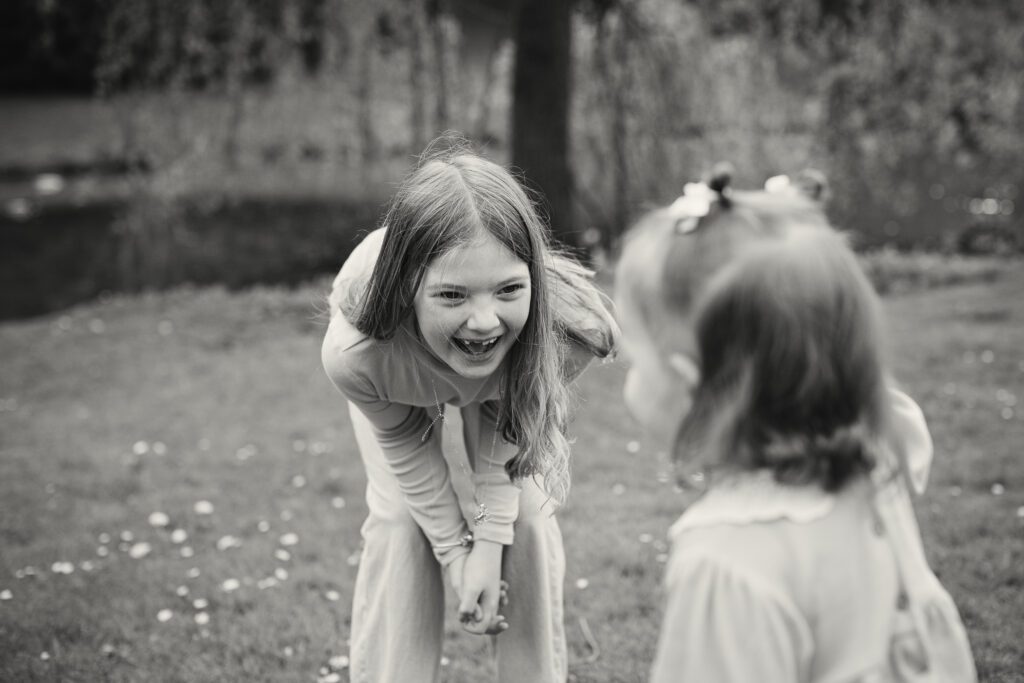 Love point of view shot of a girl playing with her younger sister