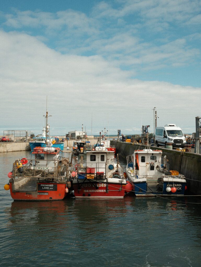 Vibrant fishing boats at Seahouses harbour, Northumberland - Shot on Fujifilm X100VI